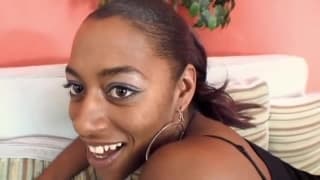 A black guy fills her holes with his dick