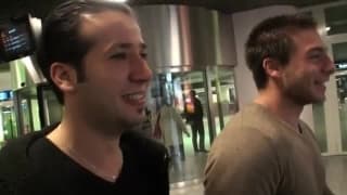 A horny brunette in a threesome on the couch