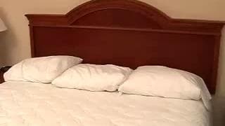 Hot young brunette enjoying herself in bed