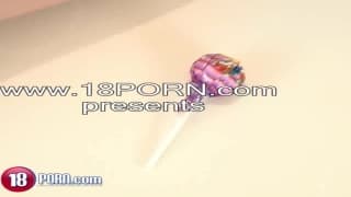 She fucks her pussy with a lollipop