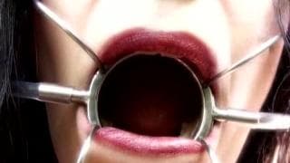 She gets tied up and pleasured outside