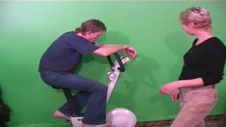 She seduces him while he is working out.