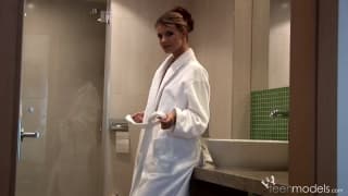 Suzie Carina is in the bathroom masturbating